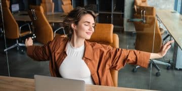 Woman enjoying AI improving workplace wellness.